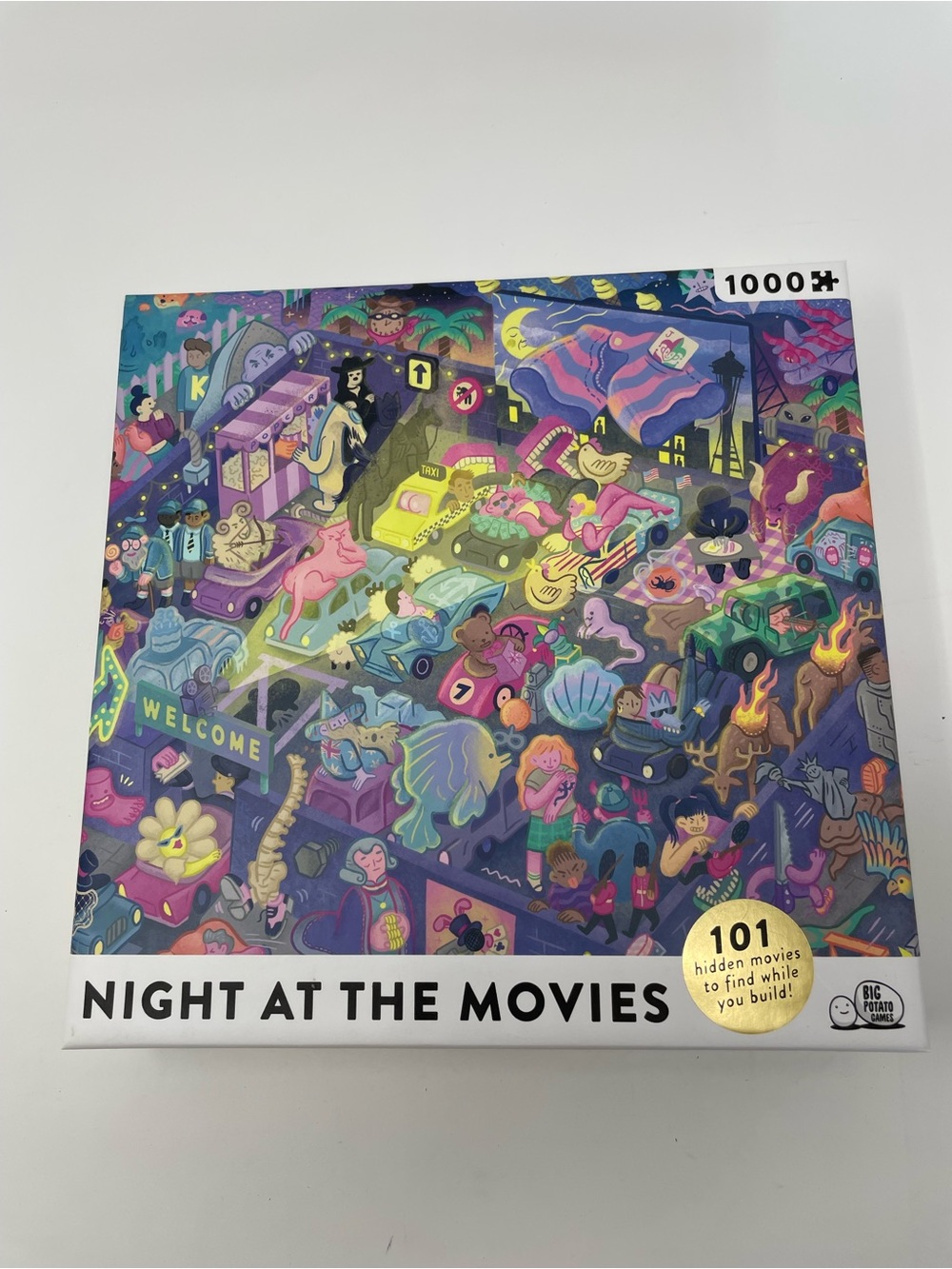 Night at the Movies 1000-Piece Jigsaw Puzzle - Colorful Purple/Blue Artwork